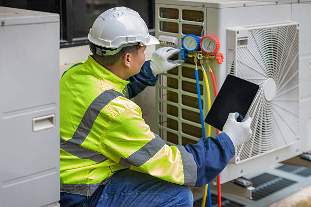 Professional Hvac technician working in Pine Island, NY